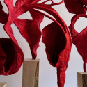 Four red sculptures using Paulownia leaf and wood